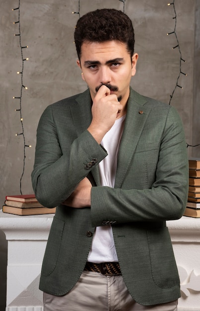 Free photo portrait of young thoughtful handsome man.