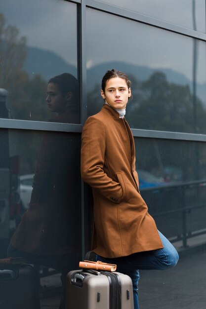 Portrait of young traveler posing