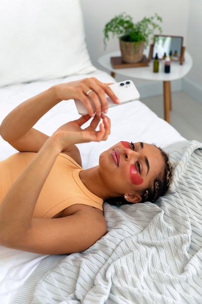 Portrait of young woman doing her beauty routine at home