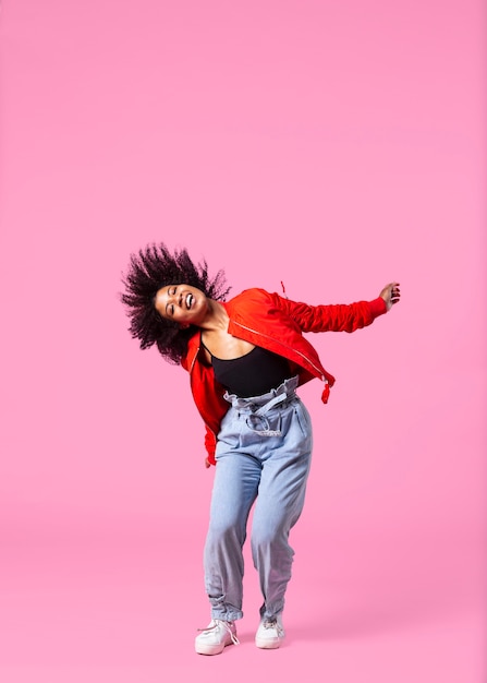 Free photo portrait young woman jumping