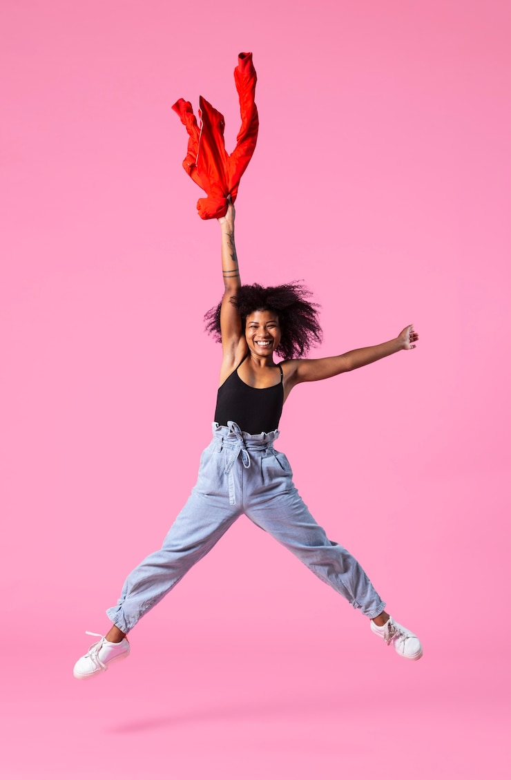 Free Photo portrait young woman jumping