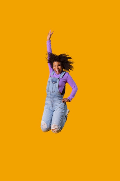 Free photo portrait young woman jumping