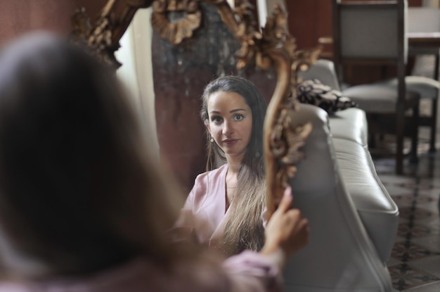 portrait of a young woman in the mirror