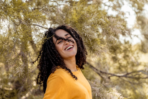 Portrait of young woman in nature