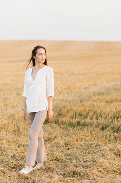 Portrait of young woman in the nature