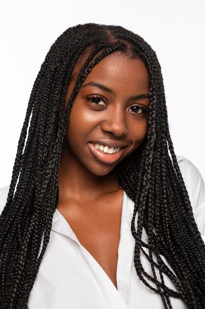 Portrait of young woman smiling isolated