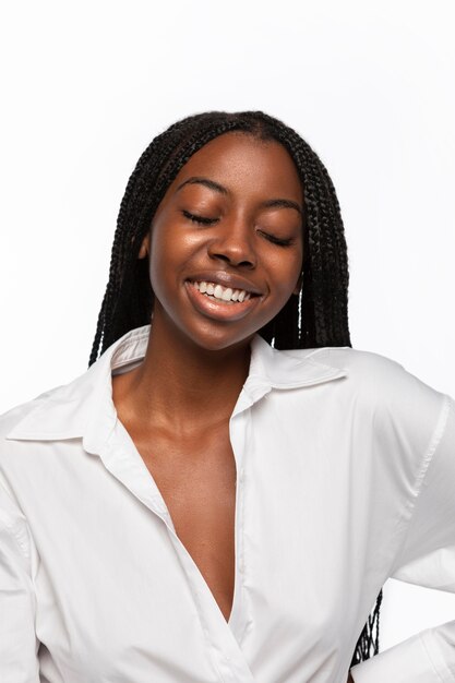 Portrait of young woman smiling isolated