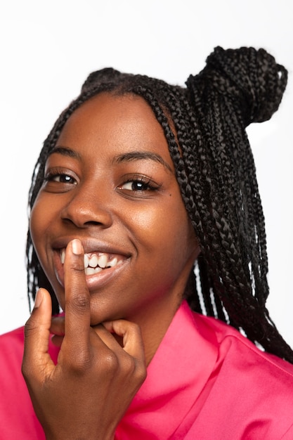 Portrait of young woman smiling isolated