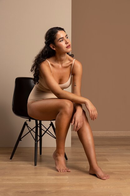 Portrait of young woman wearing shapewear