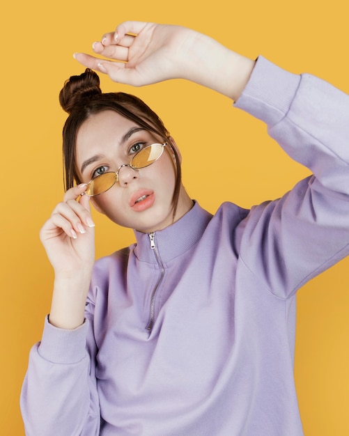 Portrait young woman wearing sunglasses