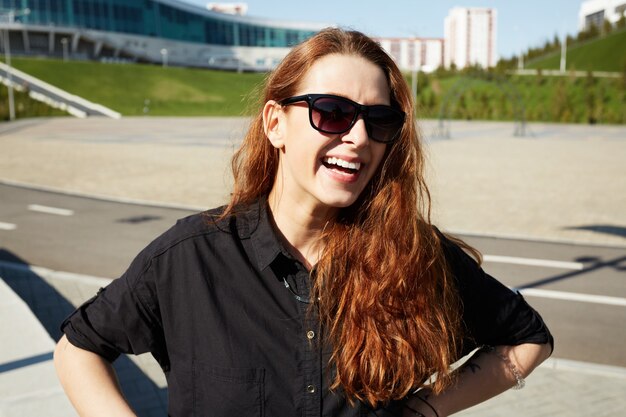 Portrait of young woman wearing sunglasses