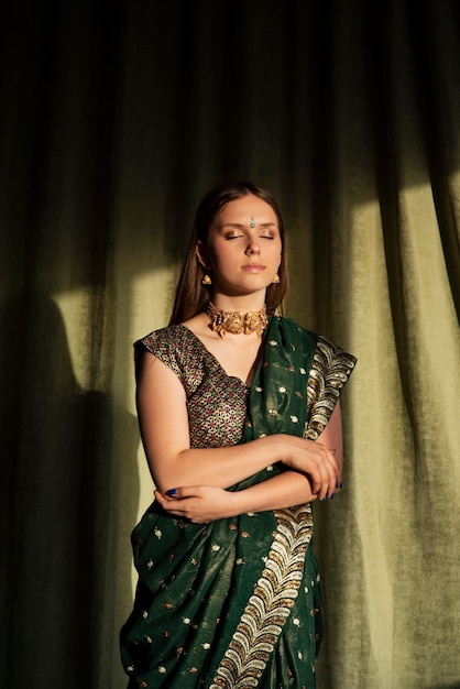 Portrait of young woman wearing tradition sari garment