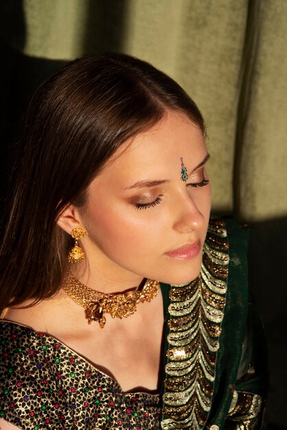 Portrait of young woman wearing traditional sari garment