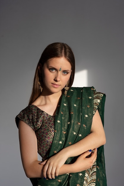 Portrait of young woman wearing traditional sari garment