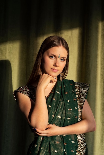 Portrait of young woman wearing traditional sari garment