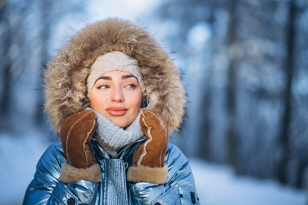 Portrait of young woman in winter jacket 