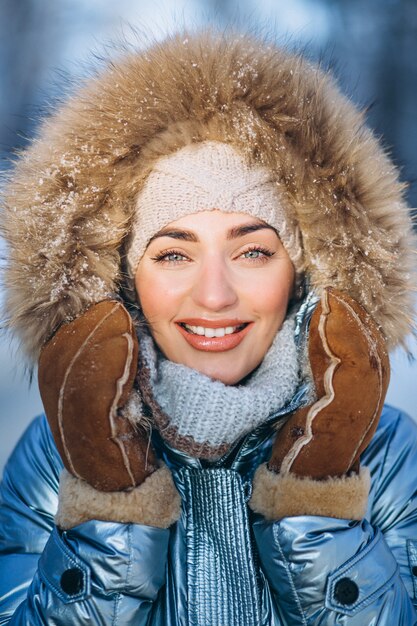 Portrait of young woman in winter jacket