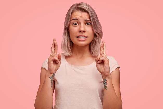 Portrait of young woman with colored hair