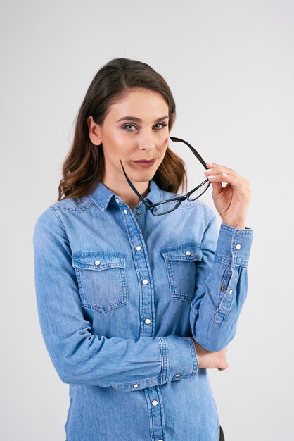 Portrait of young woman with glasses