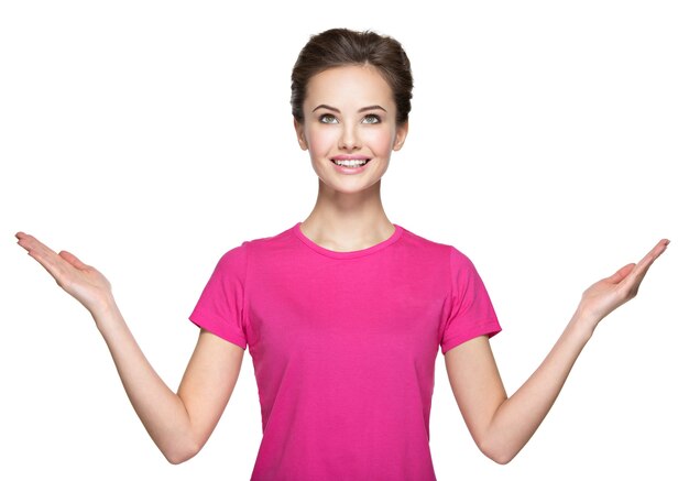 Portrait of young  woman with hands up