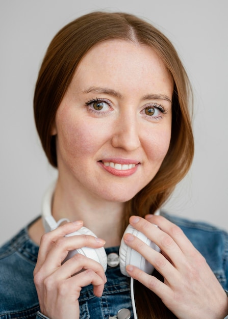 Portrait young woman with headphones