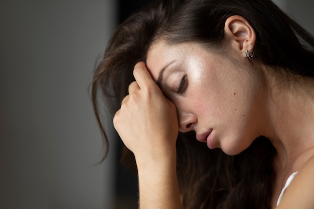 Portrait of young woman with low self-esteem