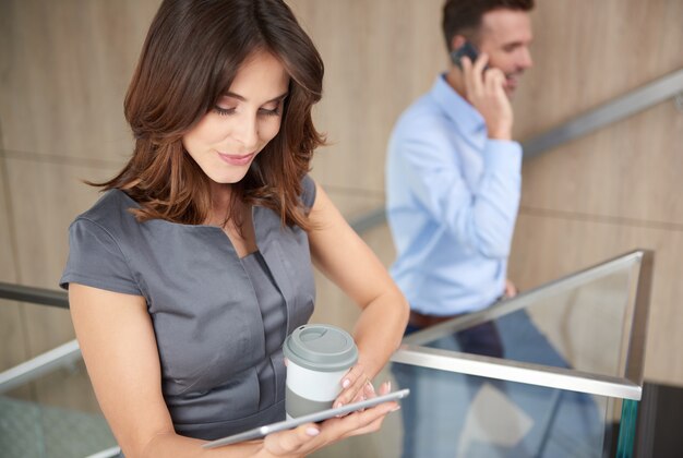 Portrait of young woman with mobile phone