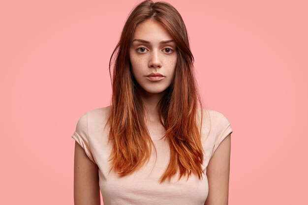 Portrait of young woman with pink T-shirt