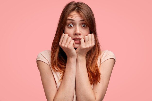 Portrait of young woman with pink T-shirt