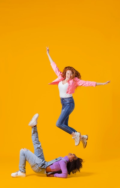 Portrait young women jumping