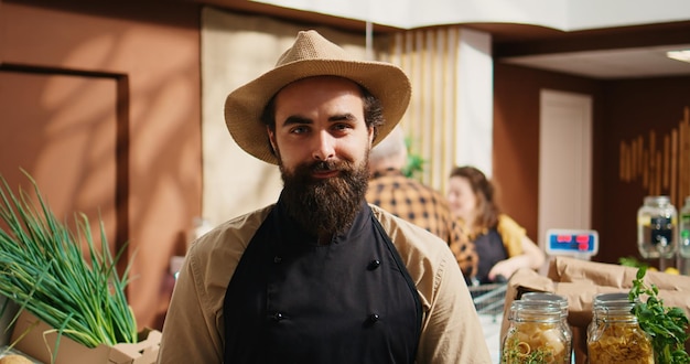 Free photo portrait of zero waste food shop vendor