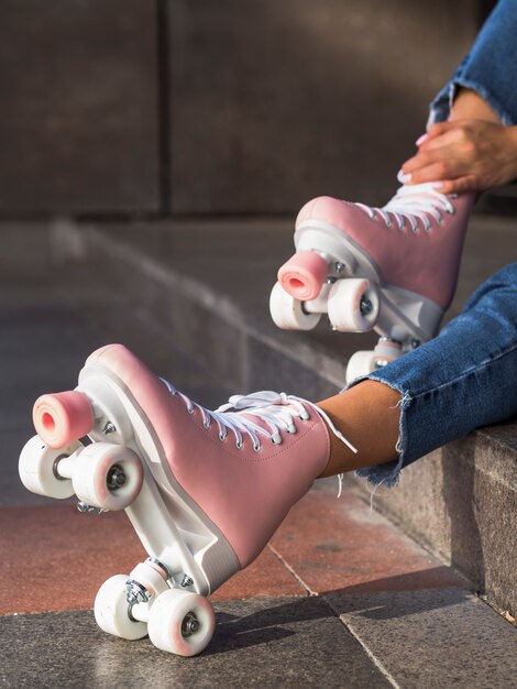 Pose of roller skates on stairs