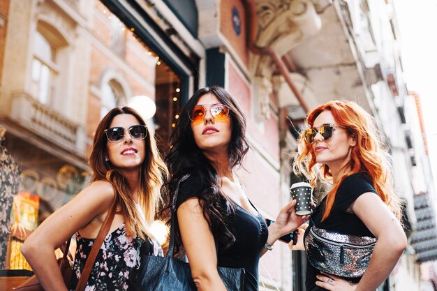 Posing women in sunglasses