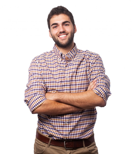 Positive brunet man with crossed arms