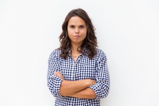 Free photo positive determined woman with arms crossed