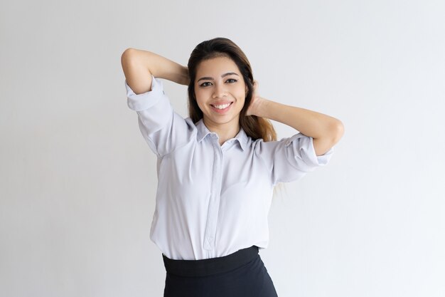 Positive girl smiling and flirting at camera