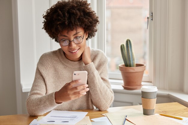 Positive owner working at home