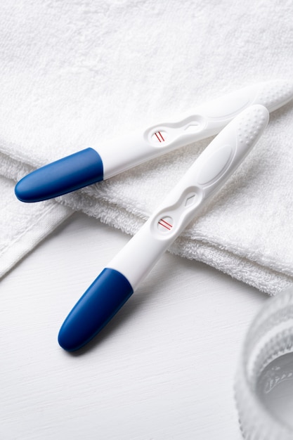 Free photo positive pregnancy tests still life