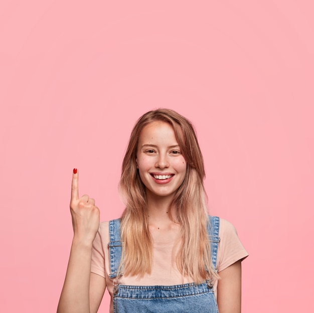 Positive smiling female with perfect teeth