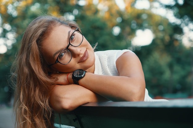 Positive woman having a break from city noise