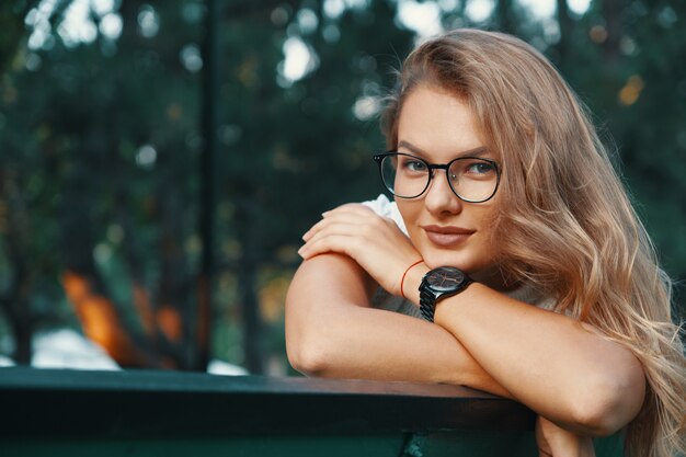 Positive woman having a break from city noise