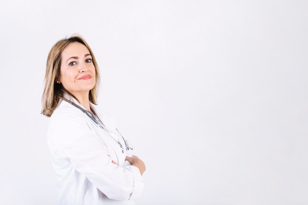 Free photo positive woman in medical overall