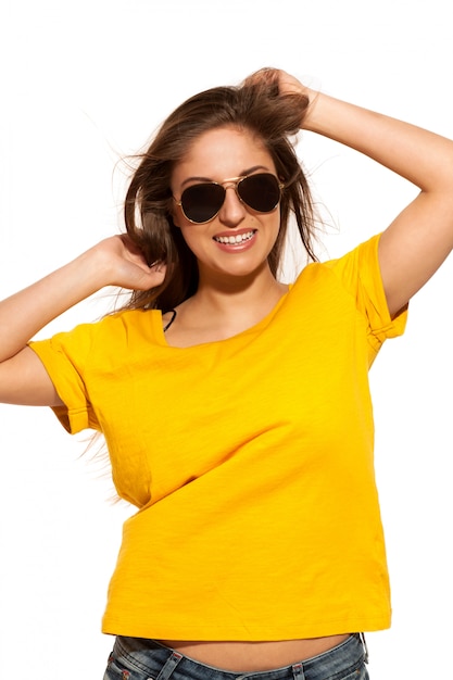 Positive young woman in sunglasses