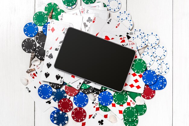 Post blog social media poker. View from above with copy space. Banner template layout mockup for online casino. Wooden white table, top view on workplace. Banner for online casinos and gambling