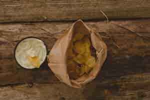 Foto gratuita patatine fritte sul tavolo