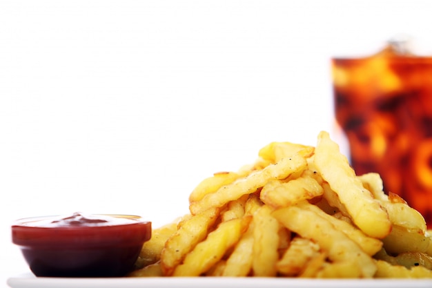 Potato fry with ketchup and cola drink