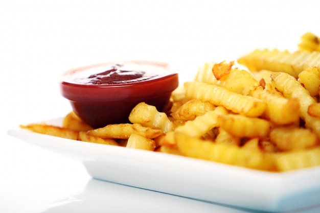 Potato fry with ketchup and cola drink