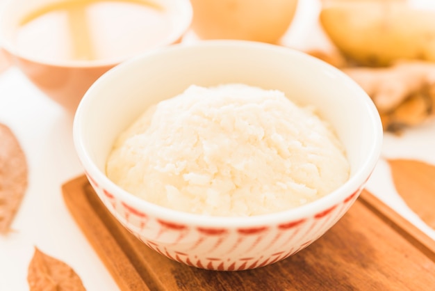 Potato puree in bowl on table