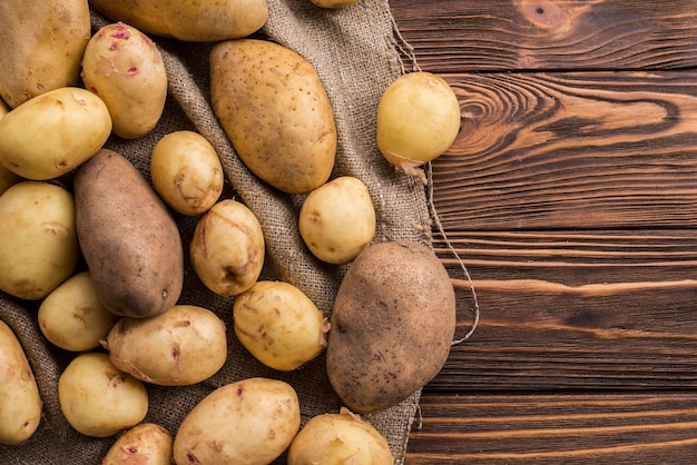 Potatoes on clothing on floor