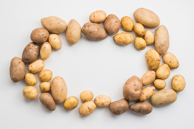 Potatoes heap on table